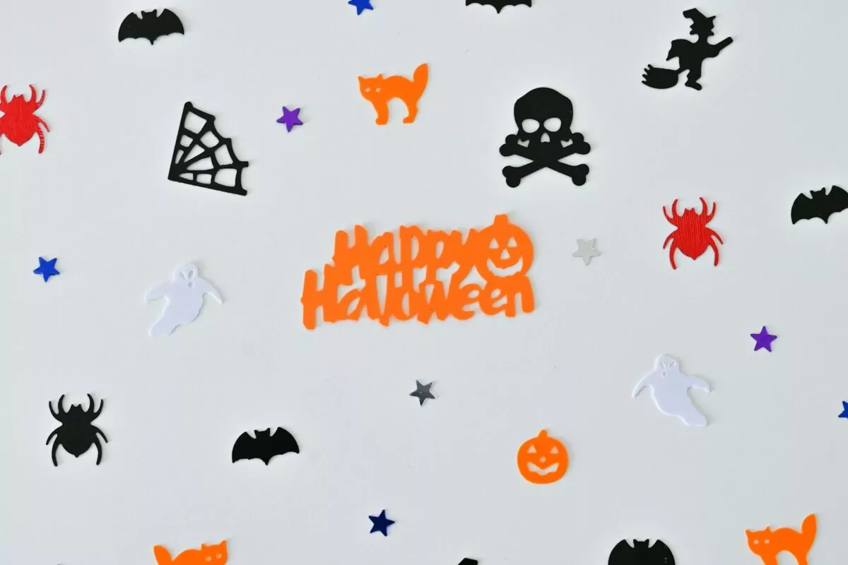 a white surface with black and orange text and a black outline